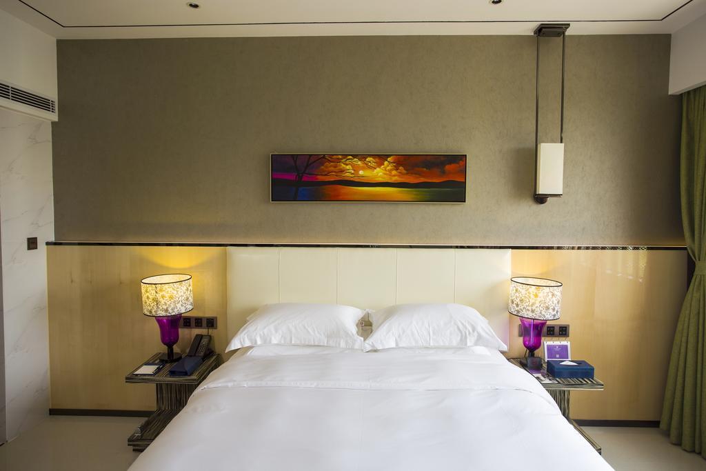 Lori Star Hotel Qionghai Habitación foto
