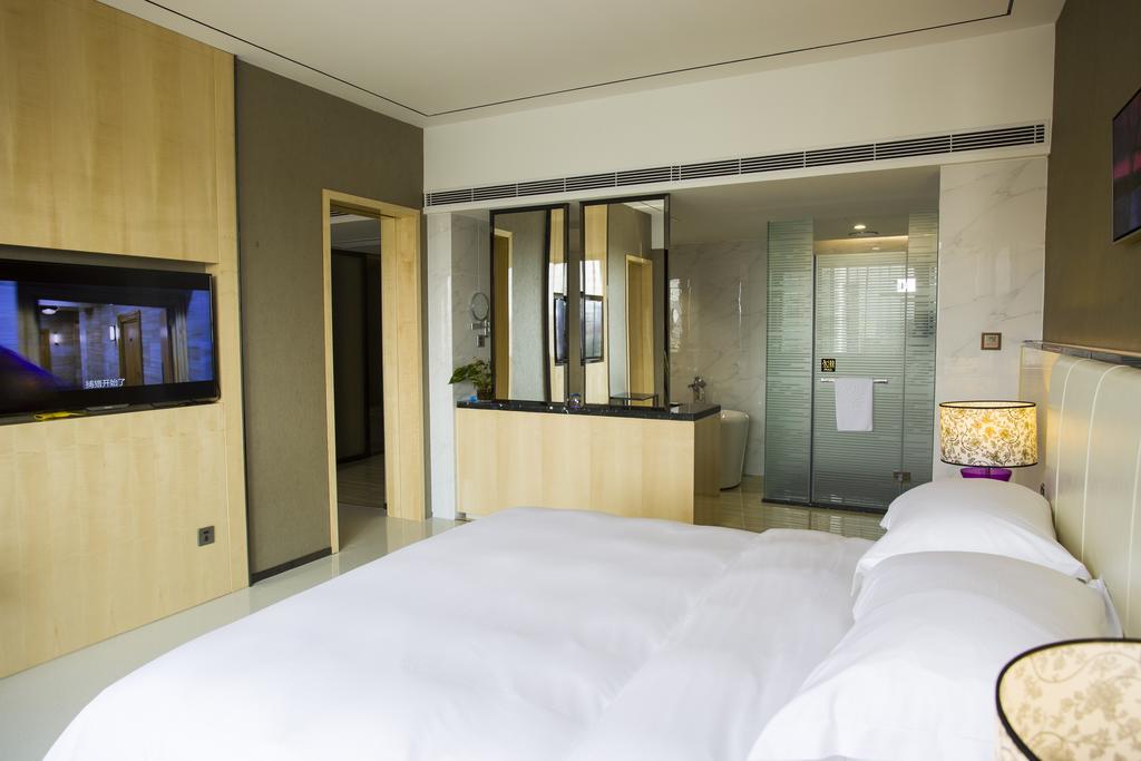 Lori Star Hotel Qionghai Habitación foto