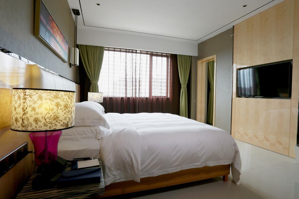 Lori Star Hotel Qionghai Habitación foto