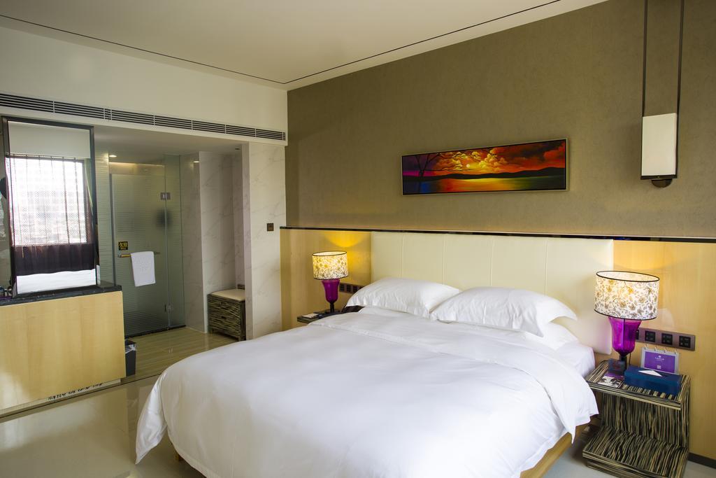 Lori Star Hotel Qionghai Habitación foto