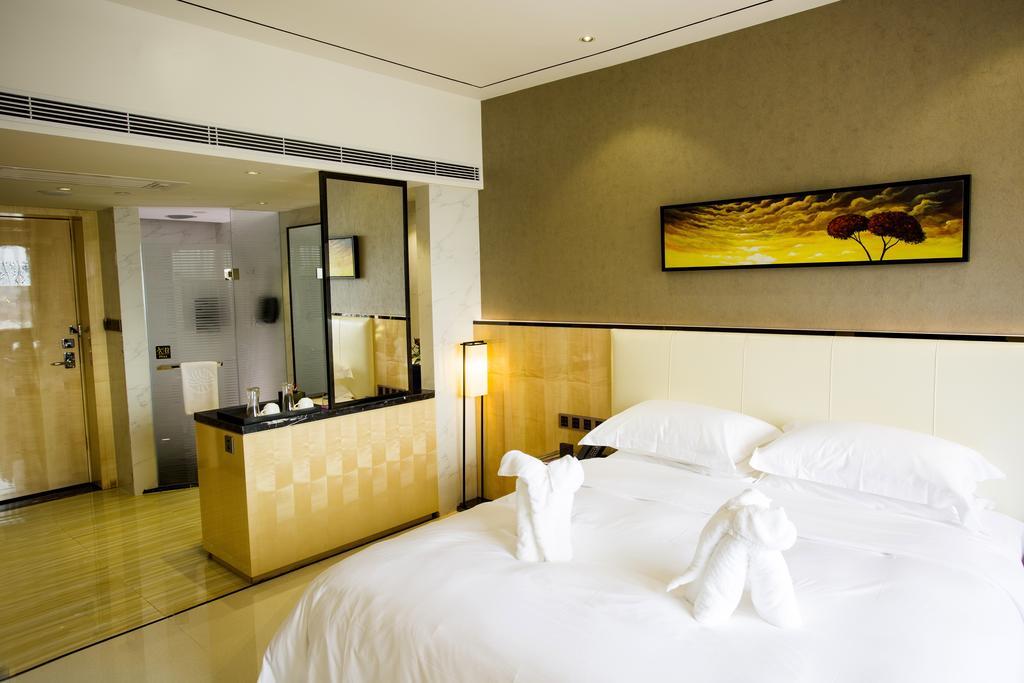 Lori Star Hotel Qionghai Habitación foto