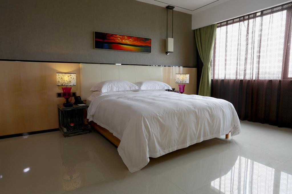 Lori Star Hotel Qionghai Habitación foto